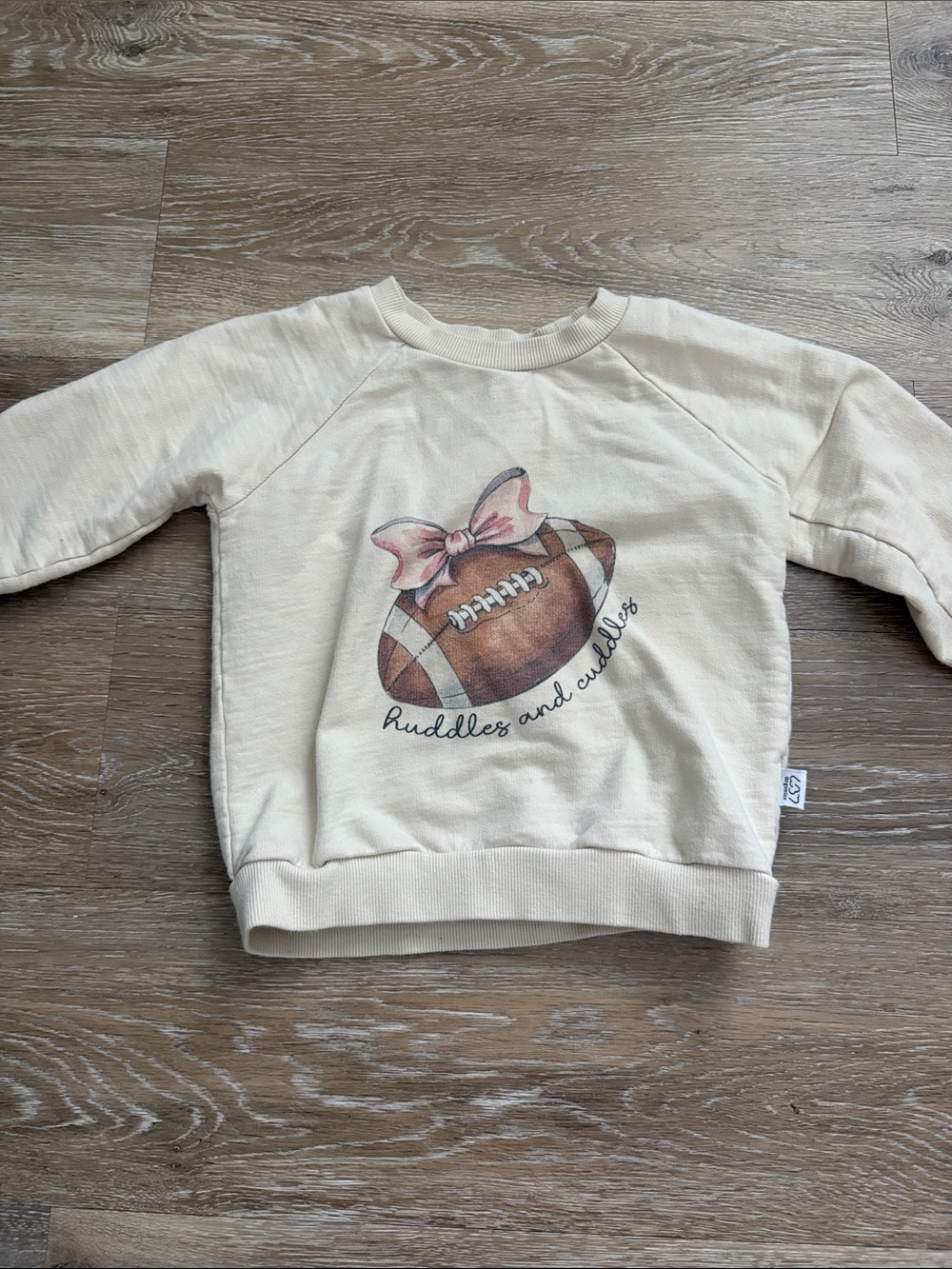 Cream Kids Sweatshirt with Football & Pink Bow